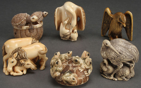 A SIX PIECE GROUP OF JAPANESE CARVED NETSUKES AND OKIMONOS, CIRCA 1950. Comprising three Netsukes;