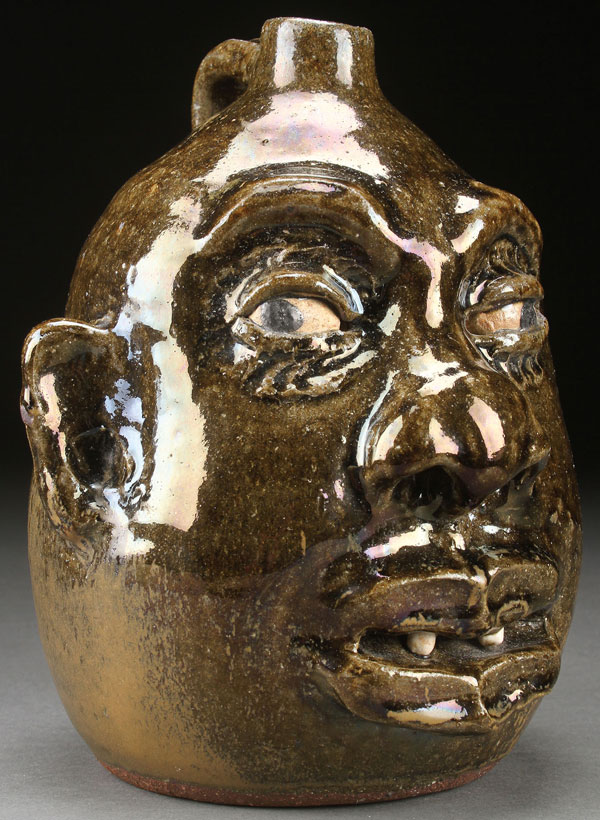 A LANIER MEADERS GLAZED POTTERY FACE JUG, THIRD QUARTER 2OTH CENTURY. Hand sculpted in the form of