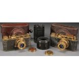 A PAIR OF RUSSIAN SOVIET PERIOD MADE COPIES OF LEICA CAMERAS. Including one bearing German WWII