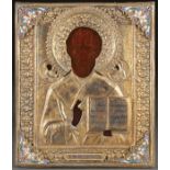 A RUSSIAN ICON OF ST. NICHOLAS, 20TH CENTURY. Overlaid with a silver gilt riza with enameled corner