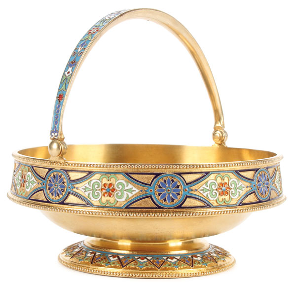 AN ATTRACTIVE RUSSIAN SILVER GILT AND ENAMEL BASKET, MOSCOW, DATED 1885. Resting on a slightly