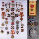 A GROUP OF 34 RUSSIAN SOVIET BADGES, CIRCA 1945-1995