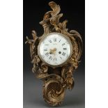 A FRENCH 19TH CENTURY BRONZE CARTEL WALL CLOCK. Of asymmetrical rococo form with scrolled acanthus