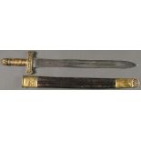 A 19TH CENTURY FOOT ARTILLERY SHORT SWORD. The brass hilt with embossed bell flower guard, twisted