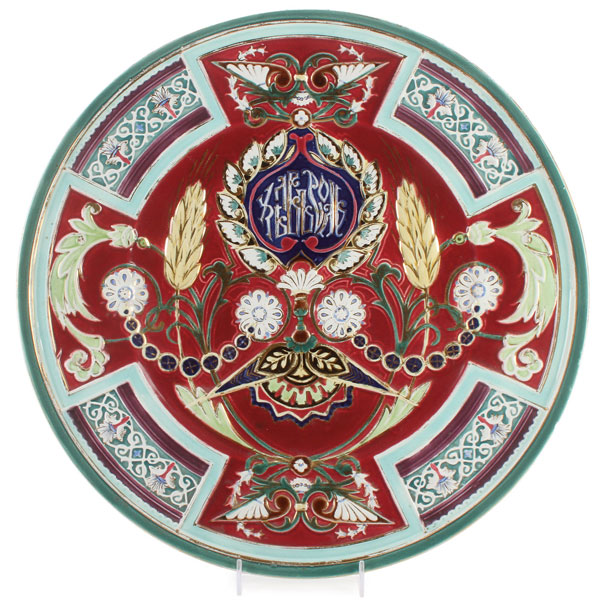 A LARGE AND IMPRESSIVE RUSSIAN GLAZED PORCELAIN CHARGER, KUZNETSOV, CIRCA 1890. The shallow cavetto