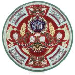 A LARGE AND IMPRESSIVE RUSSIAN GLAZED PORCELAIN CHARGER, KUZNETSOV, CIRCA 1890. The shallow cavetto