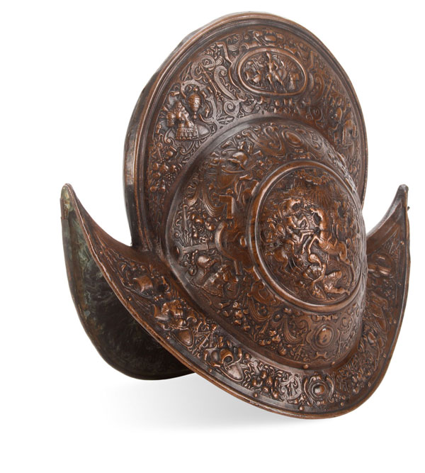 AN ELABORATE 16TH CENTURY STYLE REPOUSSÉ MORION HELMET. The central seam with very high comb and