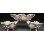 A FINE THREE PIECE OLD PARIS CENTER PIECE SET, MID 19TH CENTURY. Comprising a reticulated oval