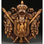 A LARGE AND IMPRESSIVE NAPOLEONIC CARVED AND GILT WOOD COAT OF ARMS, 19TH CENTURY. The wooden