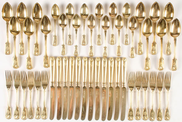 A RUSSIAN GILDED SILVER FLATWARE SET, SERVICE FOR 12, NICHOLLS & PLINCKE, ST. PETERSBURG, CIRCA