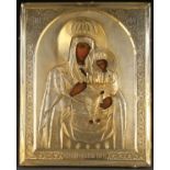 A RUSSIAN ICON OF THE CHERNIGOVSKAYA MOTHER OF GOD, CIRCA 1900. Finely painted on an incised gilt