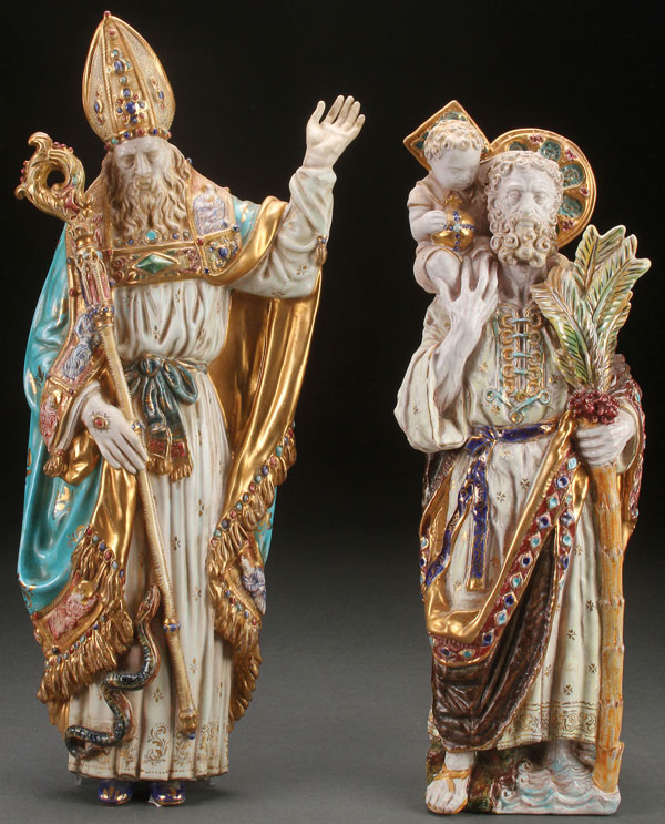 A PAIR OF PATTARINO GLAZED AND GILT CERAMIC FIGURES. Depicting St. Patrick and St. Christopher both