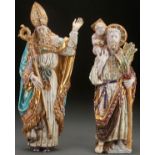 A PAIR OF PATTARINO GLAZED AND GILT CERAMIC FIGURES. Depicting St. Patrick and St. Christopher both