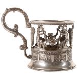 A FINE RUSSIAN SILVER TEA GLASS HOLDER, KHLEBNIKOV, MOSCOW, 1908-1917. The openwork frame with