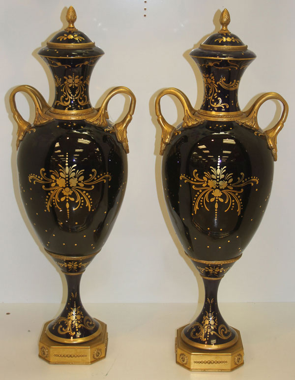 A LARGE PAIR OF SEVRES STYLE HAND PAINTED PORCELAIN AND GILT BRONZE COVERED URNS, LATE 19TH - Image 2 of 2