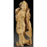 A JAPANESE CARVED IVORY OKIMONO OF AN ONNA-BUGEISHA, EDO-MEIJI PERIOD (19TH CENTURY). Well carved