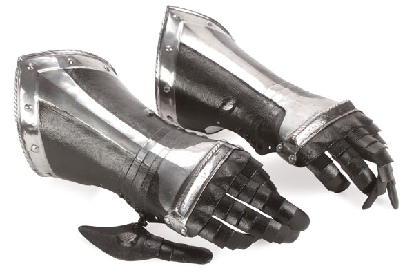 A PAIR OF GERMAN BLACK ENAMELED STEEL GAUNTLETS, PROBABLY 19TH CENTURY. With later finish and other