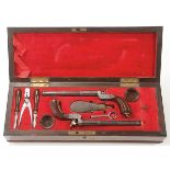 A CASED SET OF FRENCH PERCUSSION PISTOLS, 19TH CENTURY. Approximately .45 cal., single shot center