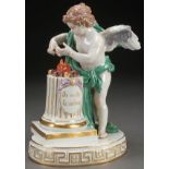 A FINE MEISSEN PORCELAIN FIGURE OF CUPID, CIRCA 1900. Depicted with a pedestal surmounted by two