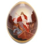 A LARGE RUSSIAN HAND PAINTED PORCELAIN EASTER EGG, 19TH CENTURY. The front of the egg painted with