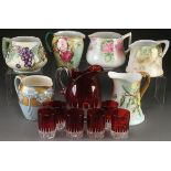 A VICTORIAN HAND PAINTED PORCELAIN AND GLASS PITCHER COLLECTION, LATE 19TH/EARLY 20TH CENTURY.