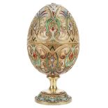 A FINE RUSSIAN SILVER GILT AND SHADED CLOISONNÉ ENAMEL EASTER EGG, 11TH ARTEL, MOSCOW, 1908-1917.