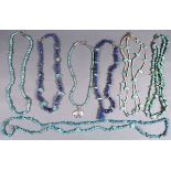 SEVEN SOUTHWEST NATIVE AMERICAN TURQUOISE AND BLUE LAPIS FETISH NECKLACES, LAST HALF OF 20TH