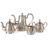 A RUSSIAN SILVER AND ENGRAVED ASSEMBLED TEA SERVICE, MOSCOW, 1899-1917. Comprising a cylindrical