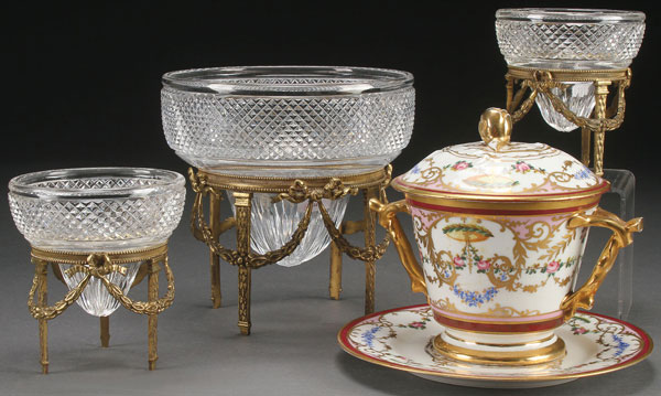 A HAND PAINTED PORCELAIN AND CUT GLASS DECORATIVE GROUP, CIRCA 1900. Comprising a Sevres style hand