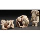 A GROUP OF THREE JAPANESE CARVED IVORY NETSUKES AND OKIMONO, PROBABLY MEIJI PERIOD. Each finely