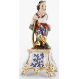 A JACOB PETIT-STYLE PARIS PORCELAIN FIGURAL ROOM SCENTER, CIRCA 1850. Finely modeled as a young