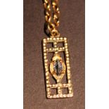 A 9ct. Gold Blue Topaz Set Pendant toget