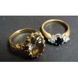 A 9ct. Yellow Gold Dress Ring Set With O