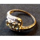 A 9ct. Gold Three Sapphire and Diamond R