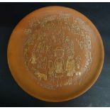 Fred Yates, 1922 - 2008, England A Terracotta Plate incised with figures before buildings, 21.