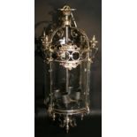 A Large Cylindrical Hall Lantern, with four curved glass panels and of pierced form,