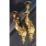 A Pair of French Ormolu Figural Wall Sconces, each of scroll form,