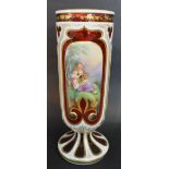 A 19th Century Bohemian Overlay Glass Vase decorated with reserves depicting figures within a