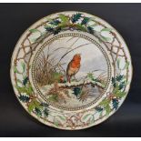 A Copeland Christmas Plate, hand painted with a robin within a winter landscape,