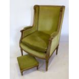 A Late 19th Early 20th Century French Fauteuil with turned tapering reeded legs together with a