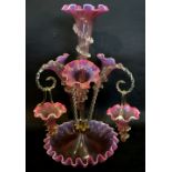 A Victorian Coloured Glass Epergne with Hanging Baskets,