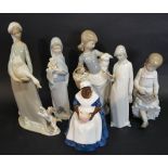A Royal Worcester Porcelain Figure 'Royal Governor's Cook' together with two Lladro porcelain