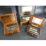 A Small Walnut Cased Musical Box Playing Four Airs,