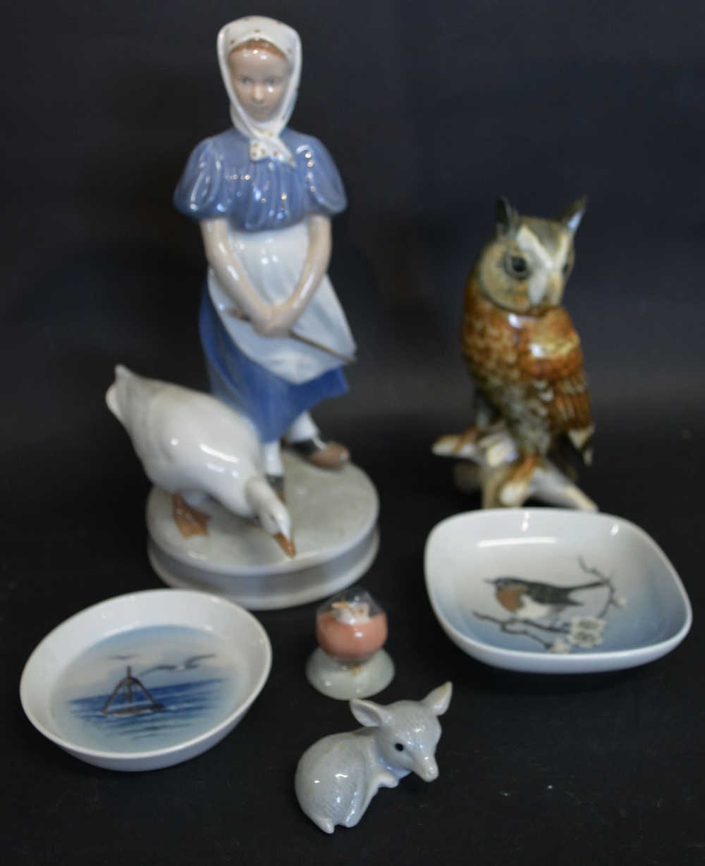 A Royal Copenhagen Porcelain Model of a Girl with a Goose,