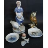 A Royal Copenhagen Porcelain Model of a Girl with a Goose,