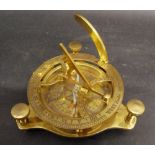 A Brass Compass with Sun Dial, bearing inscription West London,