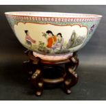 A 19th Century Chinese Large Famille Rose Bowl decorated in coloured enamels with reserves