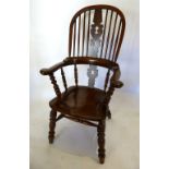 An Early 19th Century Elm Windsor Armchair,