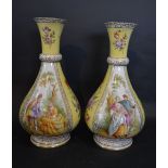 A Pair of Berlin Porcelain Oviform Bottle Neck Vases each hand painted with reserves depicting