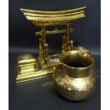 A Chinese Brass Inkstand in the form of a Pagoda, 23 cms tall,